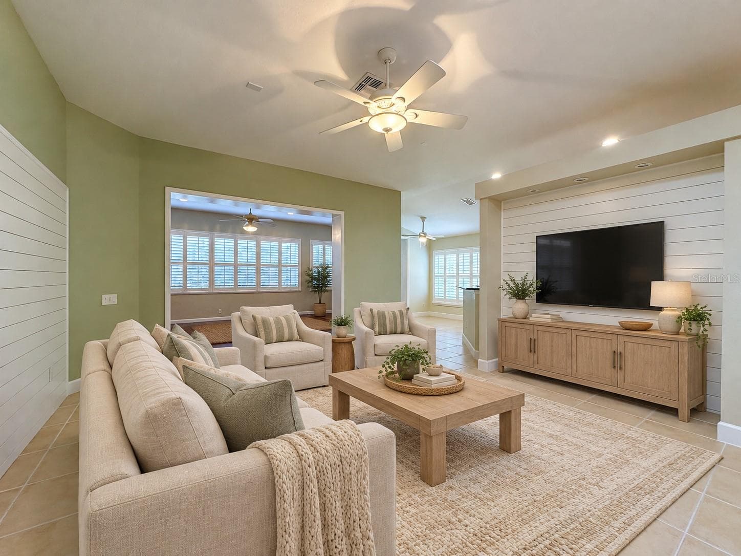 Family room staged - 516 PLAYA DR, DAVENPORT