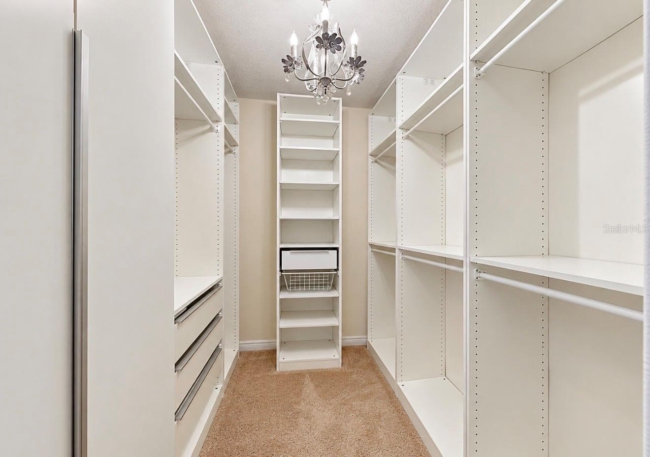 Primary Closet 1 with Custom Built-ins - 12130 STREAMBED DR, RIVERVIEW