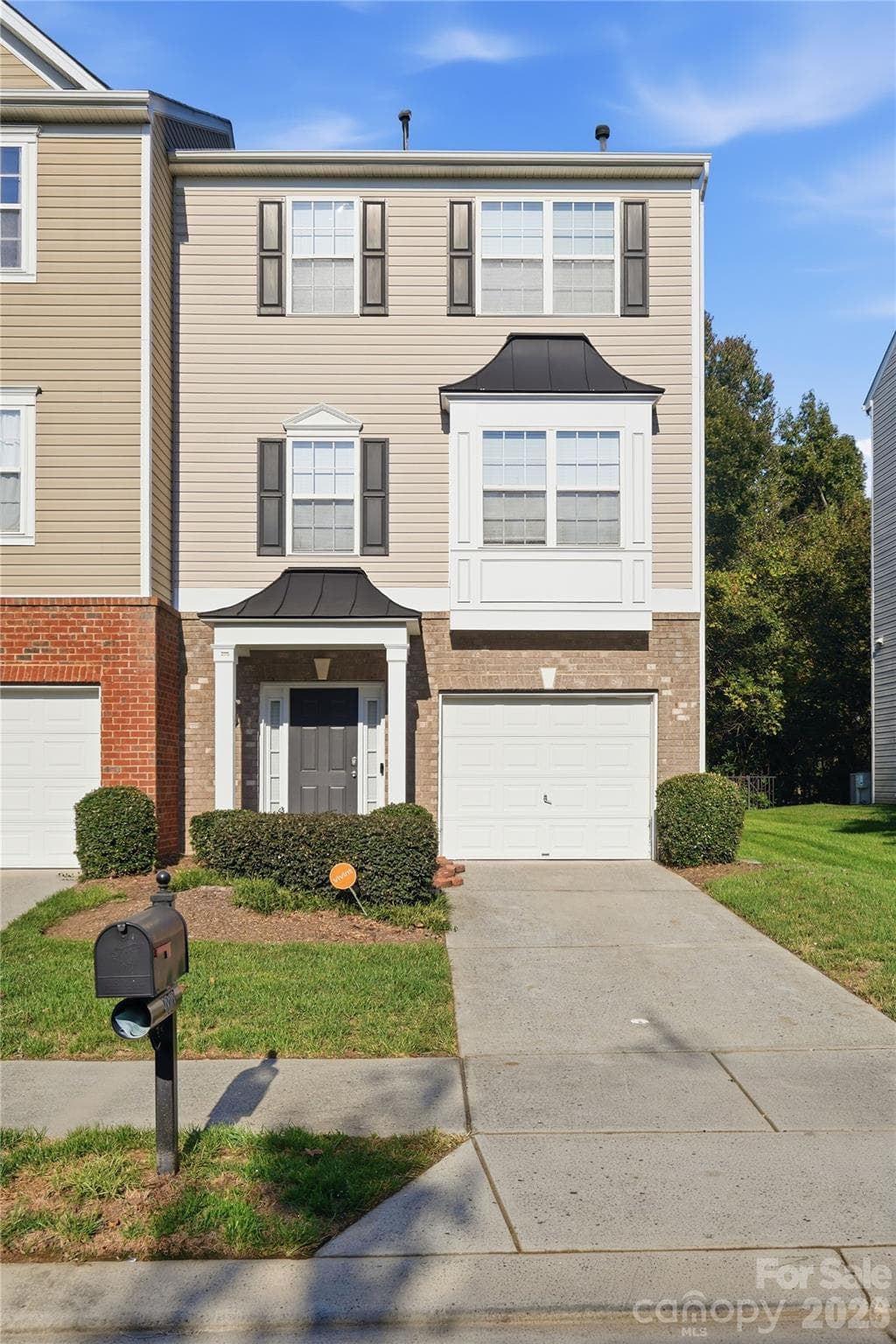 Townhouse at 9808 Walkers Glen Drive NW, Concord, photo 3 of 13