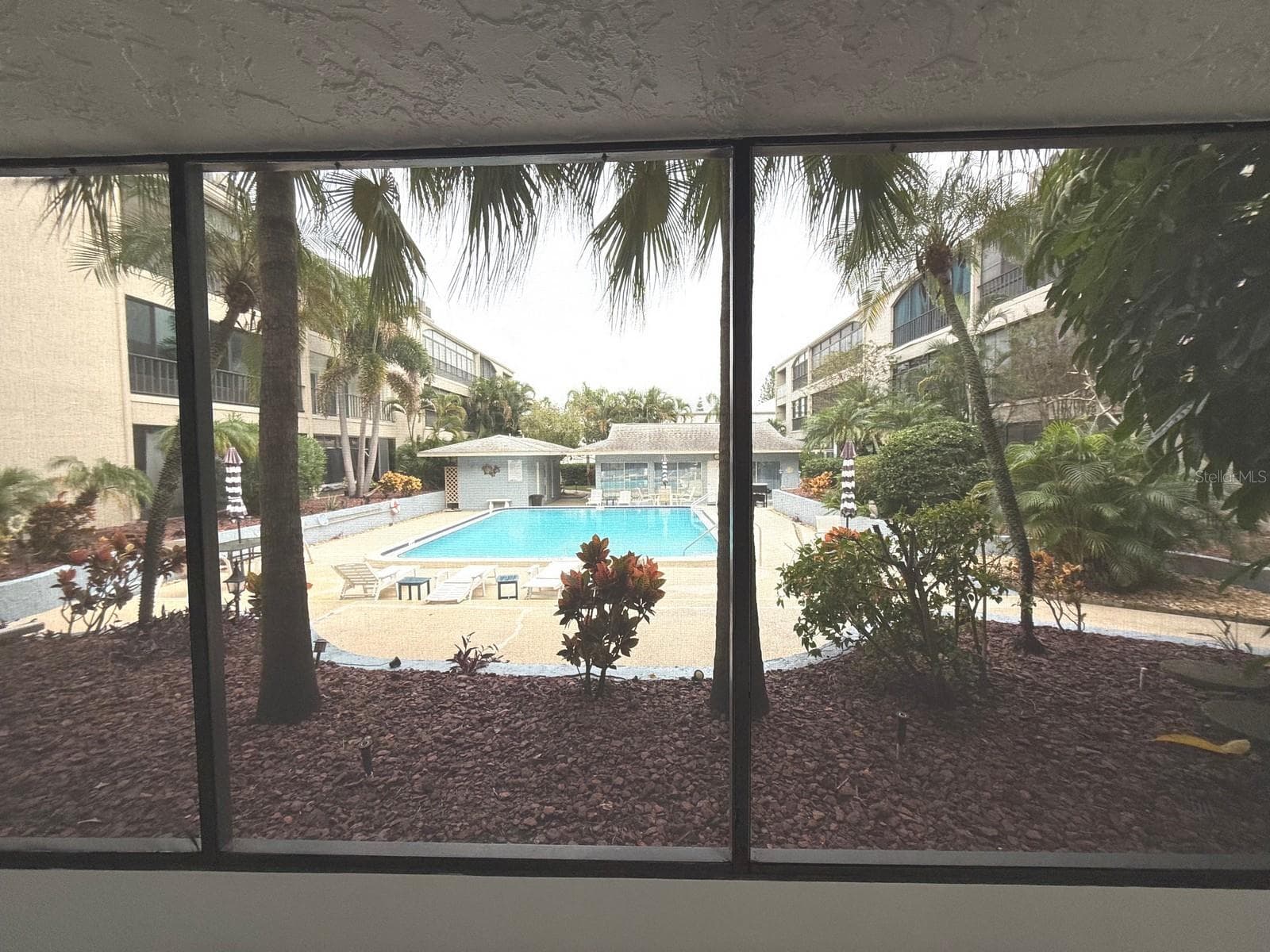 POOL and GARDEN VIEW - 215 VALENCIA BLVD #107, BELLEAIR BLUFFS
