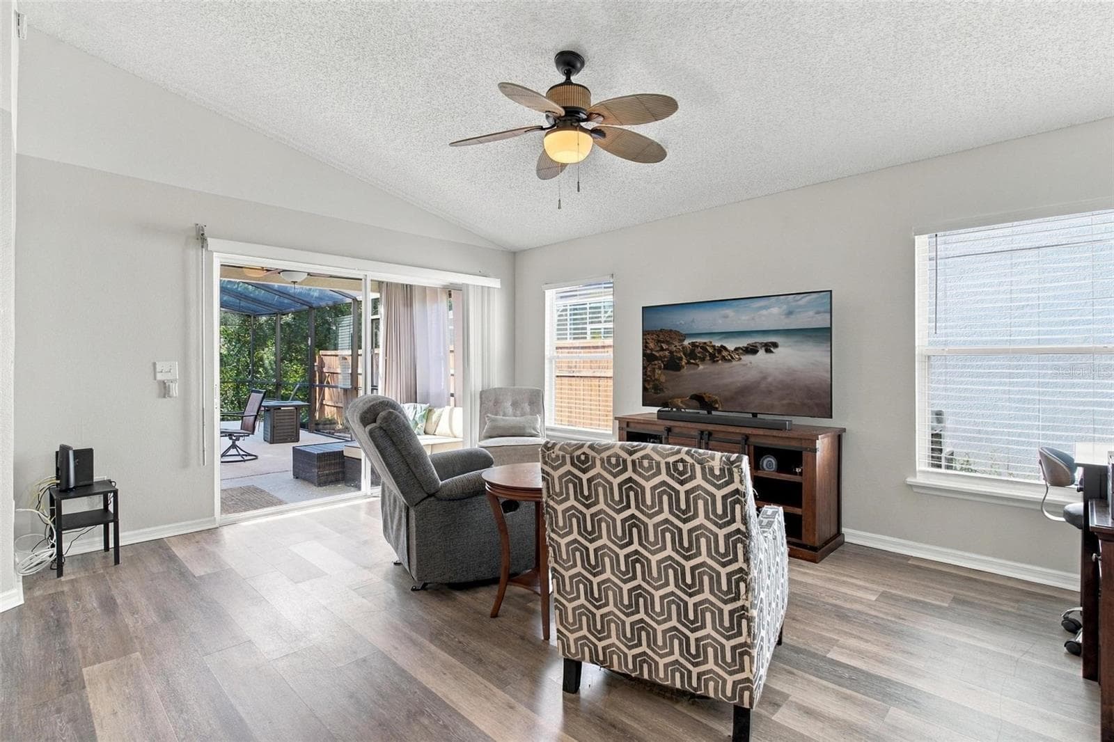 Family Room with Sliding Doors to Pool - 945 CLEAR CREEK CIR, CLERMONT