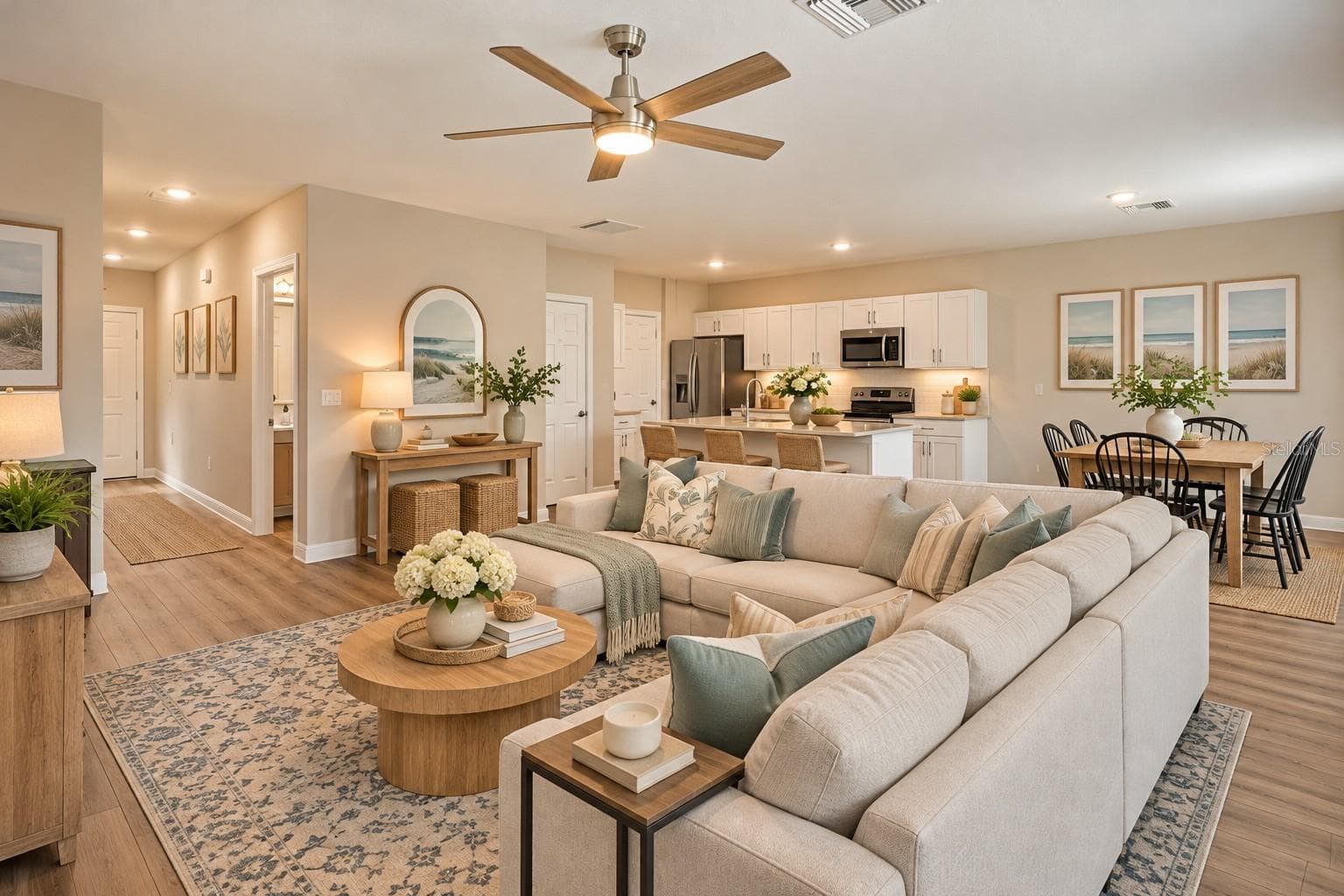 Open Concept family room digitally staged - 7580 FREESIA TRCE, WESLEY CHAPEL