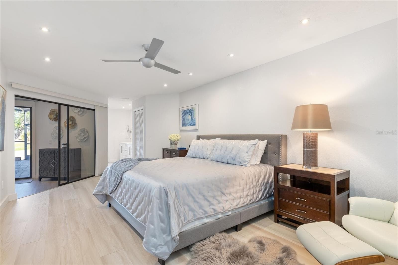 Spacious bedroom with ensuite bath at end - 5021 SAN ROCCO CT, PUNTA GORDA