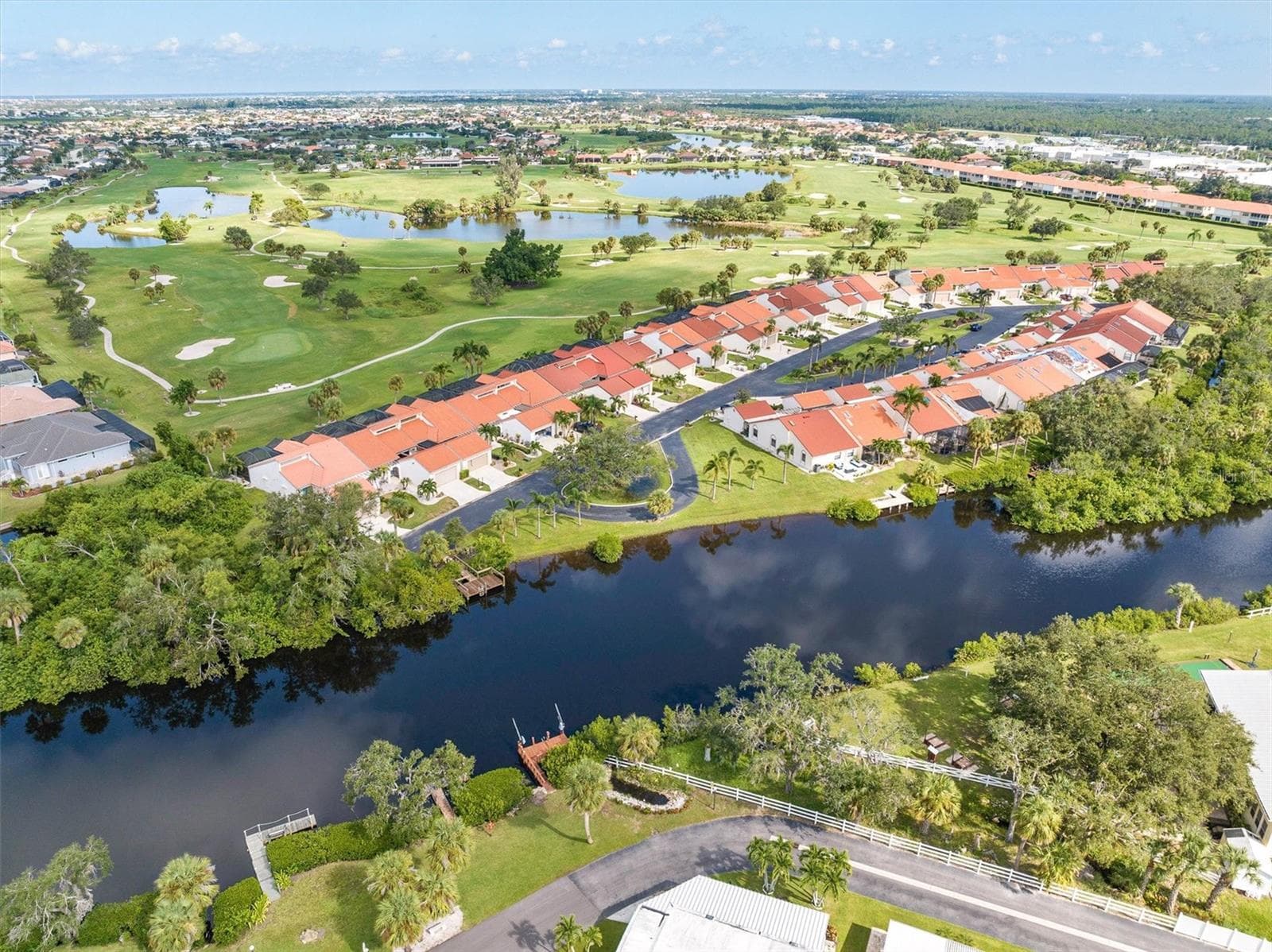 Community dock. Fish Alligator Creek from the dock or launch your canoe or kayak. Explore nature's best and if you're ready paddle all the way to the harbor or the Riveria restaurant! - 5021 SAN ROCCO CT, PUNTA GORDA