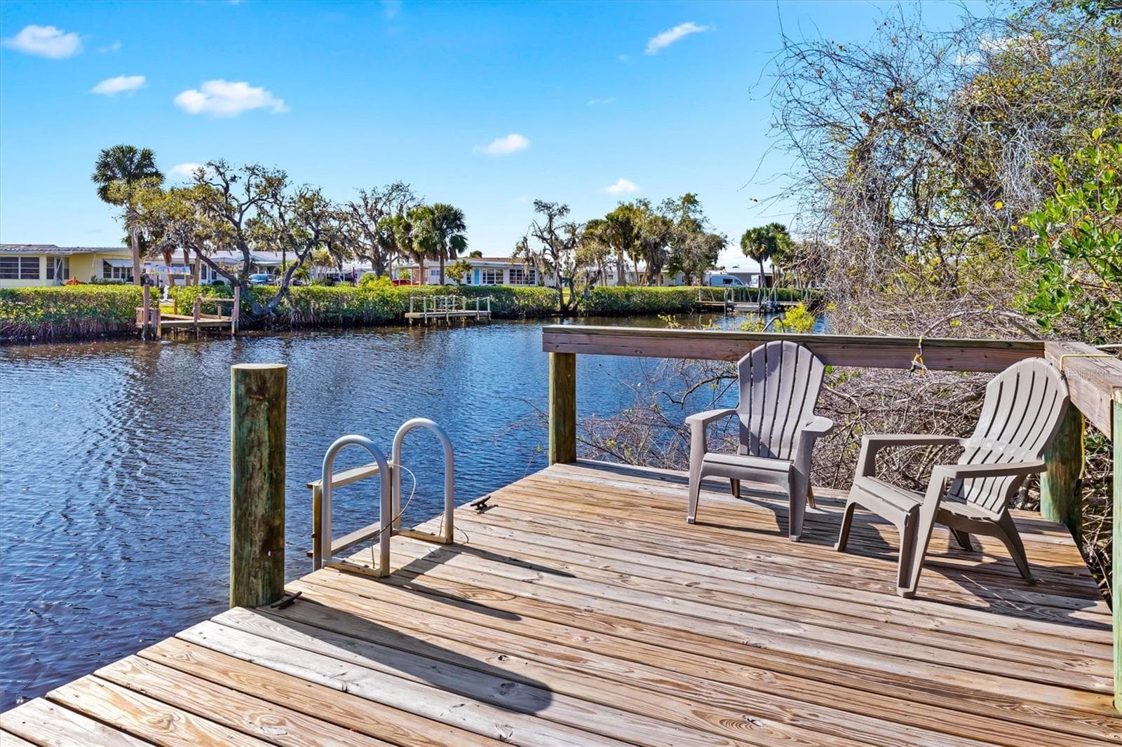 Community dock. Relax with your favorite beverage. - 5021 SAN ROCCO CT, PUNTA GORDA