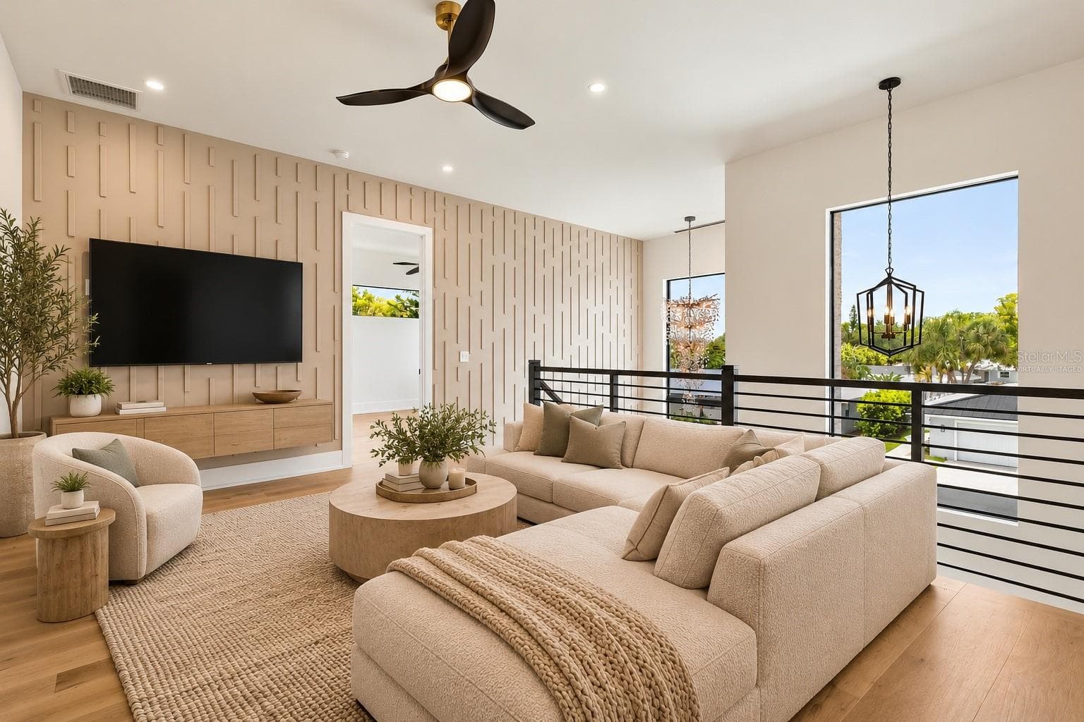 Virtually Staged, outside of primary bedroom upstairs can be used as a second seating area. - 1870 JASMINE DR, SARASOTA