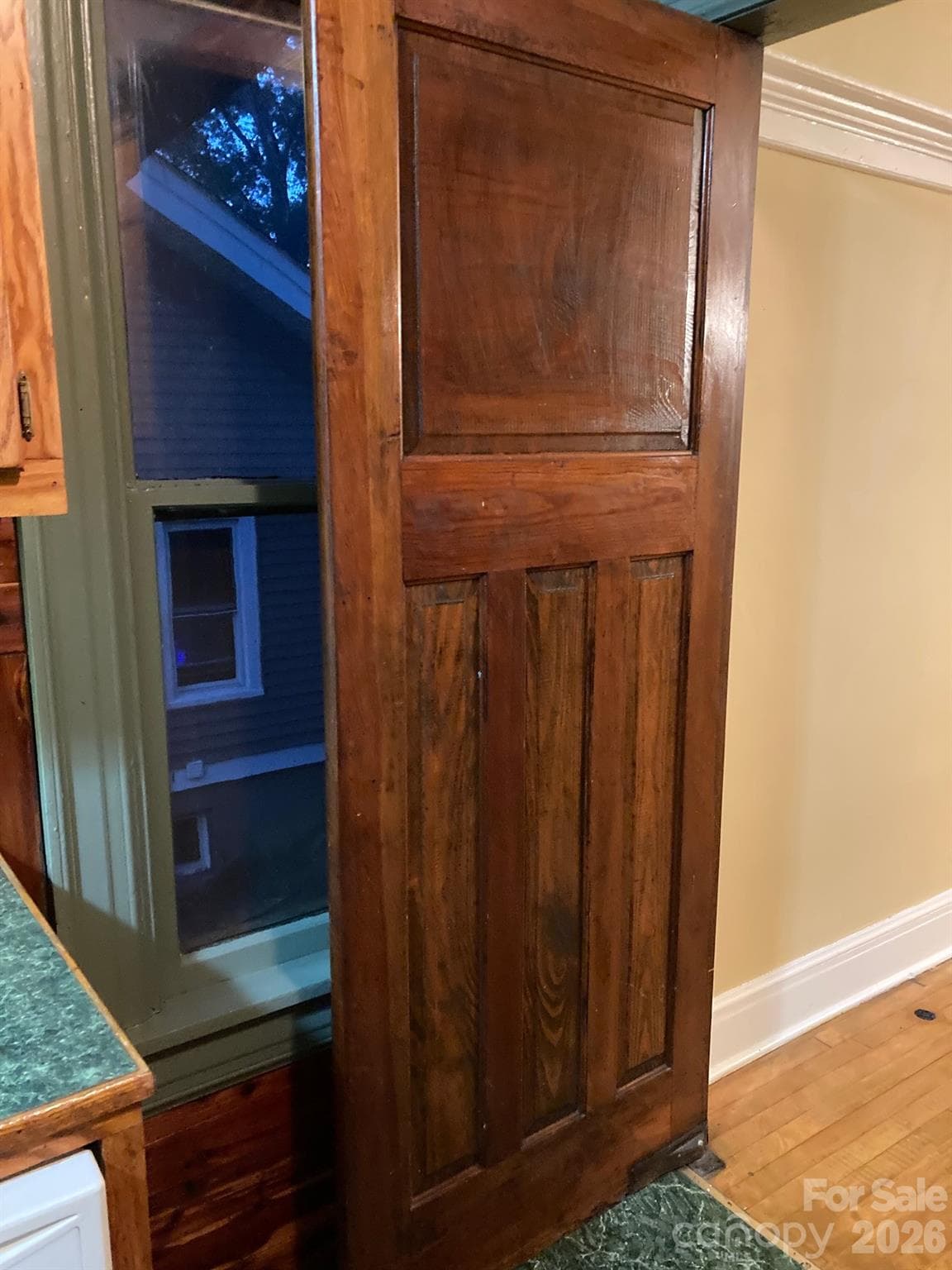 Swinging door from Dining Room to Kitchen. - 326 S 3rd Street, Albemarle