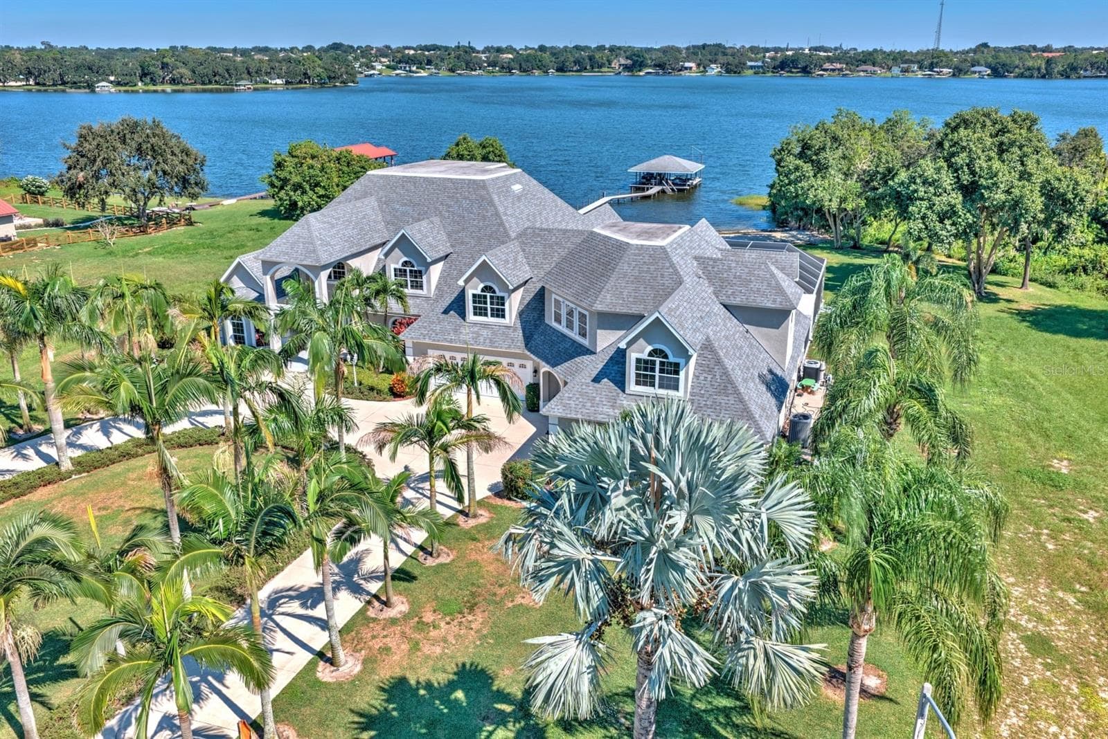 Single Family Residence at 492 SUNSET POINTE DR, LAKE PLACID, photo 2 of 59