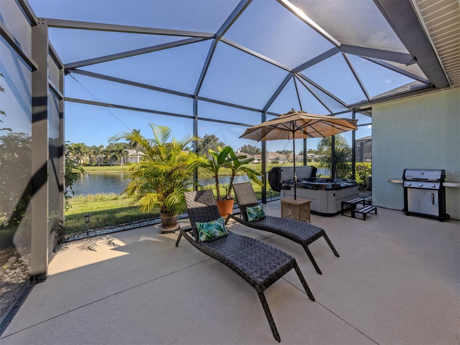 This is what Florida living is all about! Imagine leisurely mornings, breezy afternoons, and picture-perfect evenings on your gorgeous extended lanai, where the shimmering lake creates a breathtaking backdrop! Spacious, screened, and surrounded by natural beauty, it's an irresistible spot to kick back, entertain, and savor every beautiful moment! - 443 BERMUDA ISLES CIR, VENICE