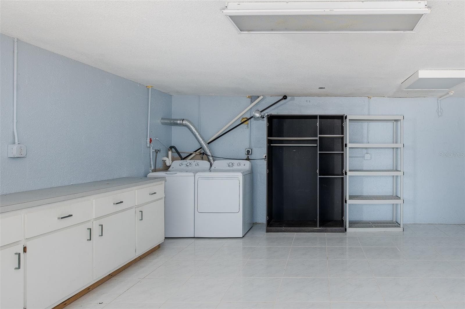 laundry area lower level - 3138 BLUFF BLVD, HOLIDAY