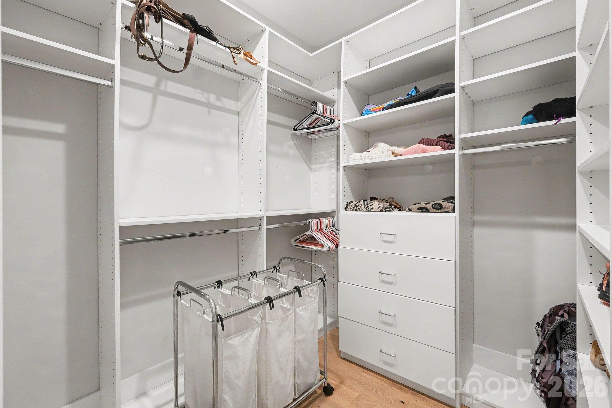 Large Primary custom closet - 5605 Caneel Lane, Denver
