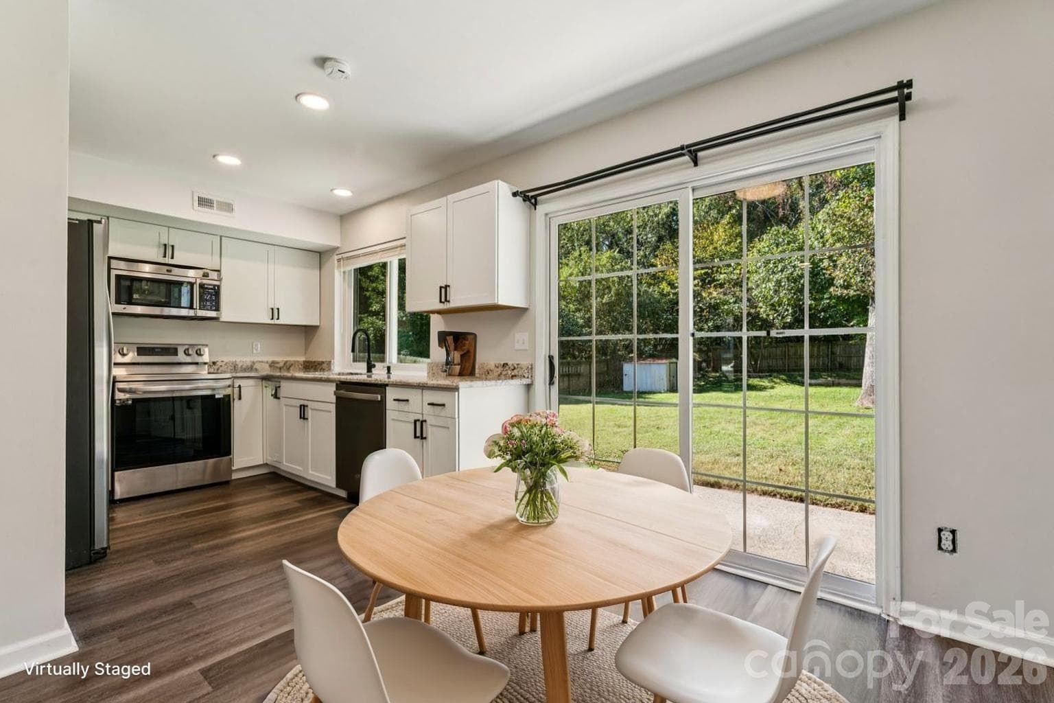 Dining area into Kitchen - 6719 Montezuma Trail, Charlotte