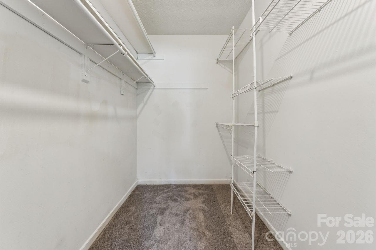 Primary walk-in closet - 6719 Montezuma Trail, Charlotte