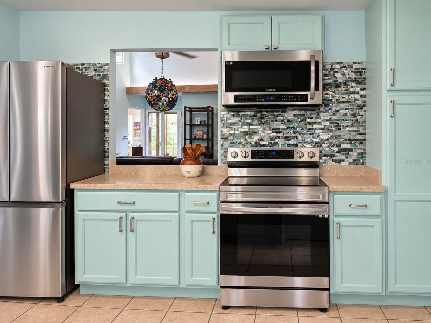 Stainless appliances and glass tile backsplash - 2310 QUAIL CT, BRADENTON