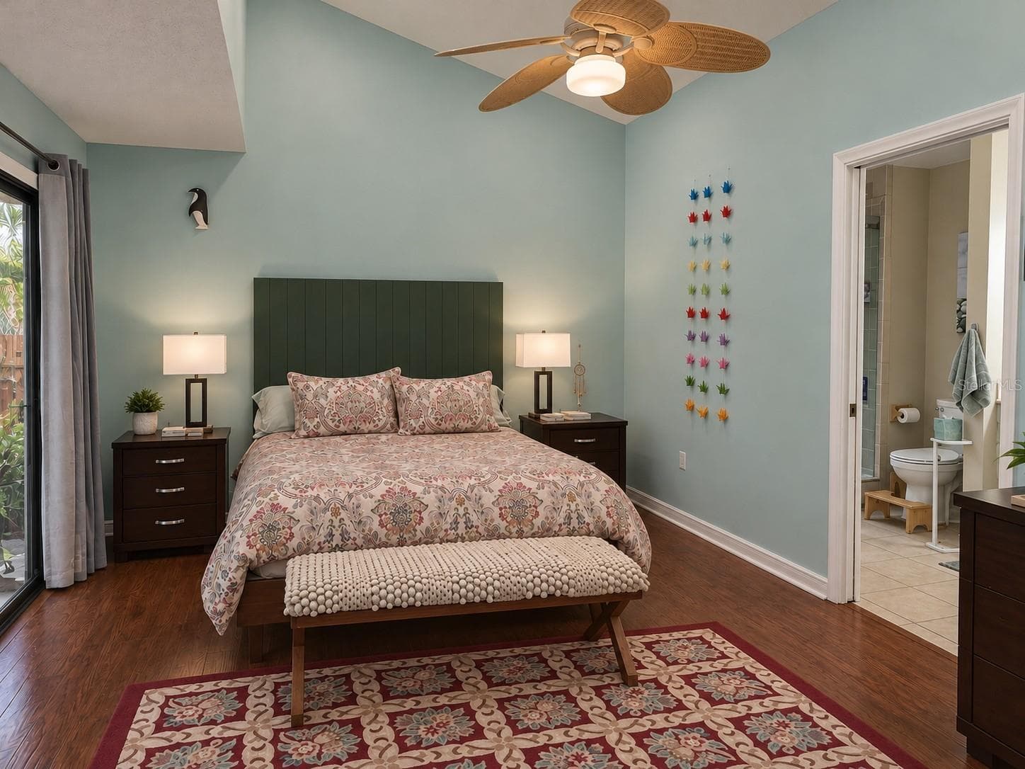 Primary bedroom with sliders to lanai - 2310 QUAIL CT, BRADENTON