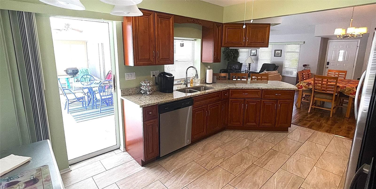 Kitchen w/ access to Lanai - 1009 LABELLE TER NW, PORT CHARLOTTE