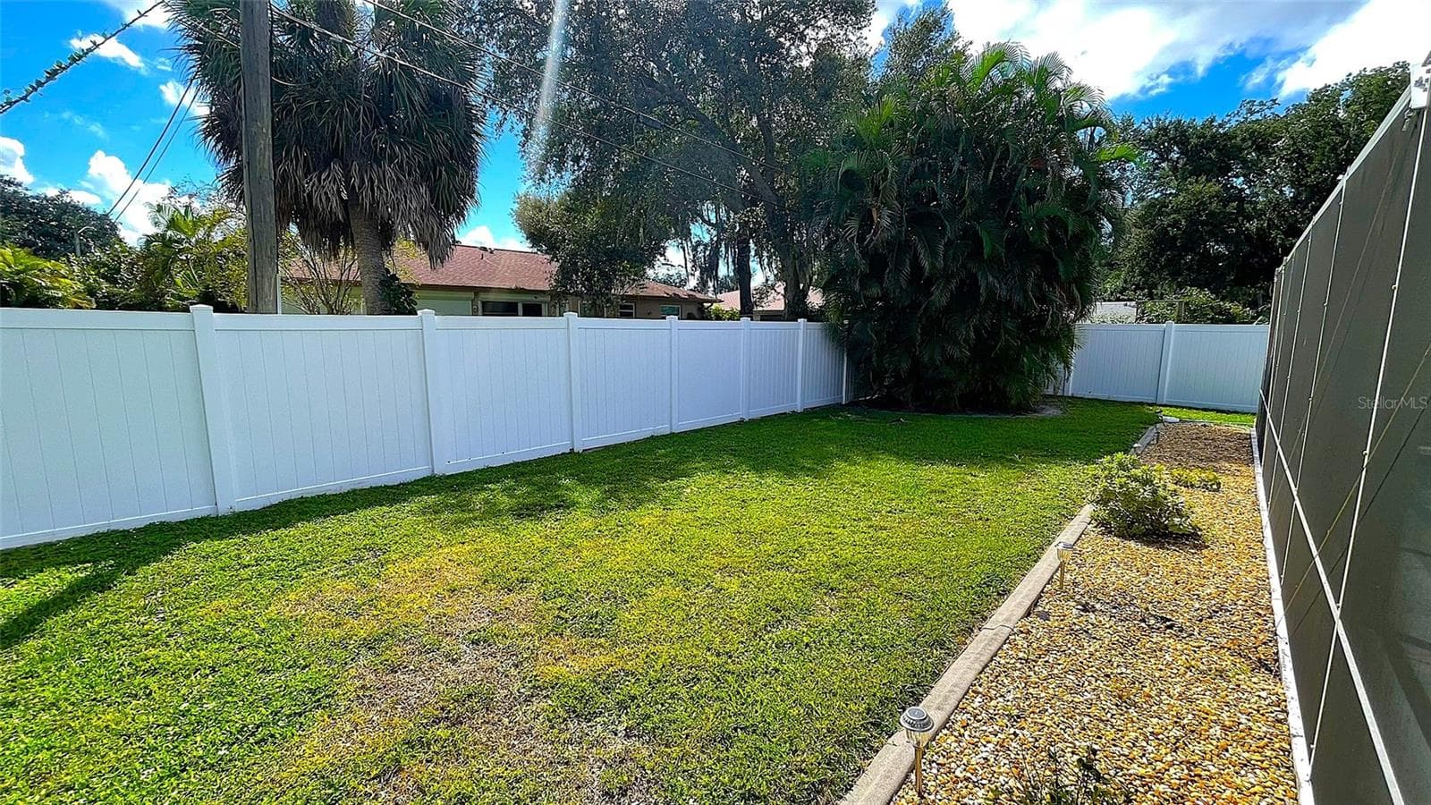 Fenced-in backyard - 1009 LABELLE TER NW, PORT CHARLOTTE