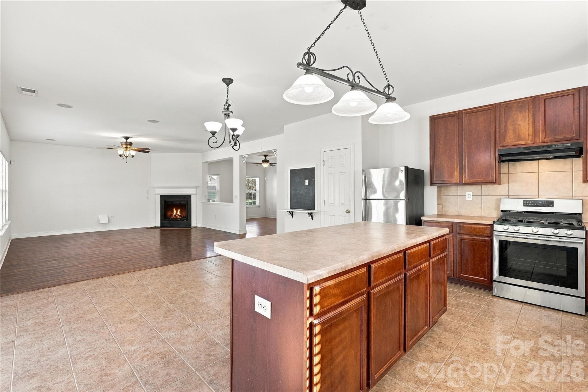 The center island looks out to the living room, which is ideal for cooking while you entertain. - 327 Annaberg Lane, Monroe
