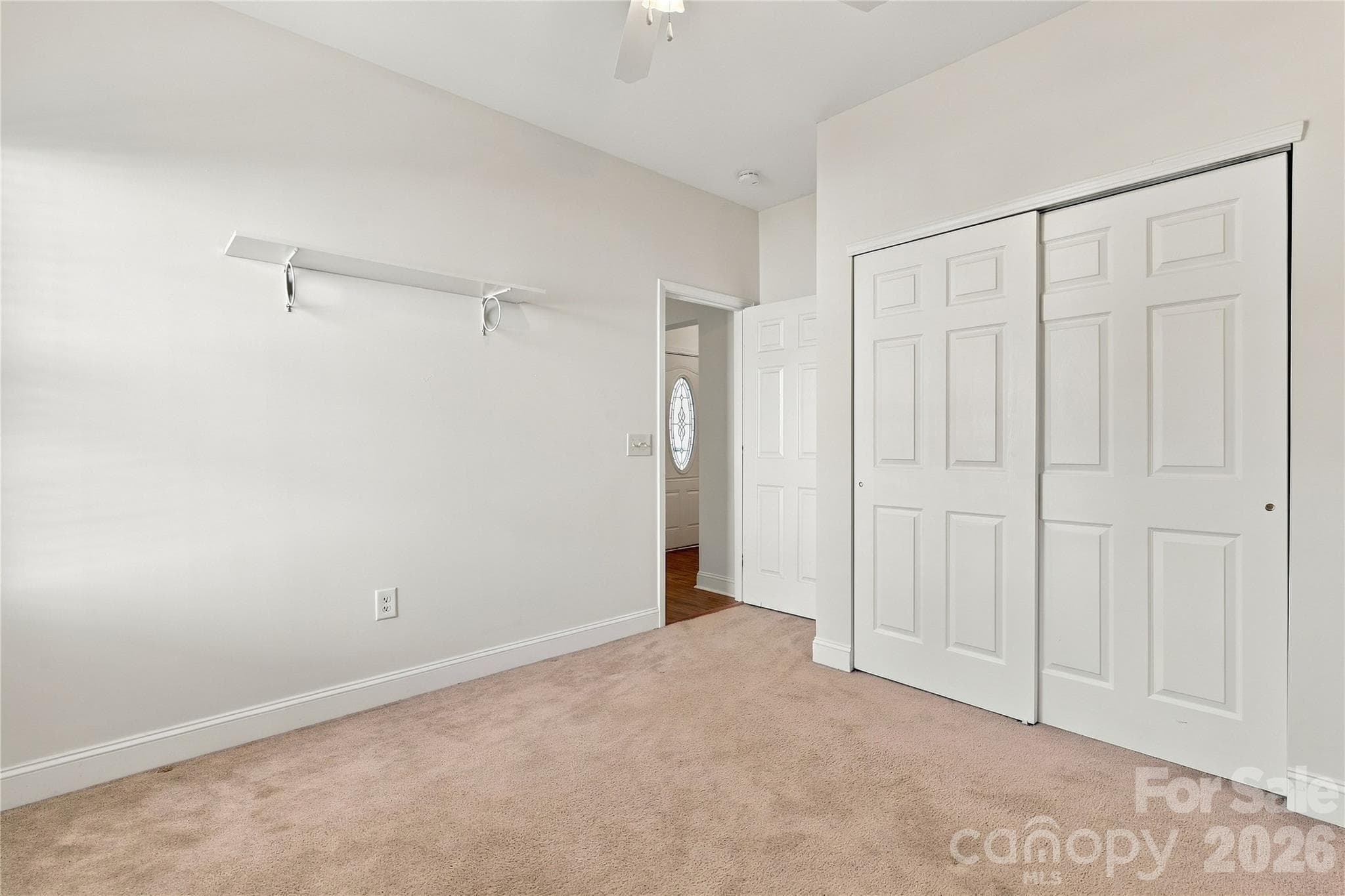 This bedroom has a double-door closet and a flexible layout. It could be a guest room, office, or hobby space. - 327 Annaberg Lane, Monroe