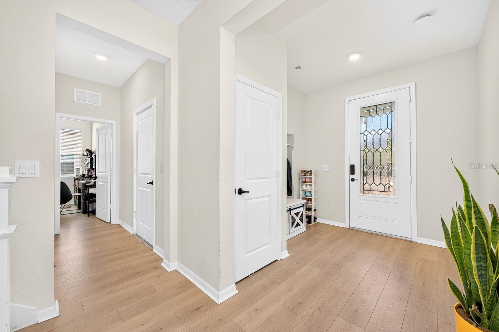 Just off the foyer is the first-floor Bedroom and full Bath. - 1785 PETIOLE PL, KISSIMMEE