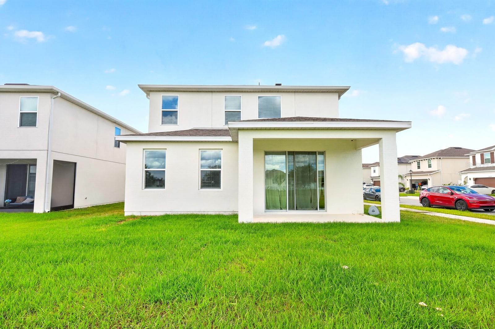 The GENEROUS BACKYARD offers a wonderful space for outdoor dining, weekend gatherings or simply unwinding at the end of the day. - 1785 PETIOLE PL, KISSIMMEE