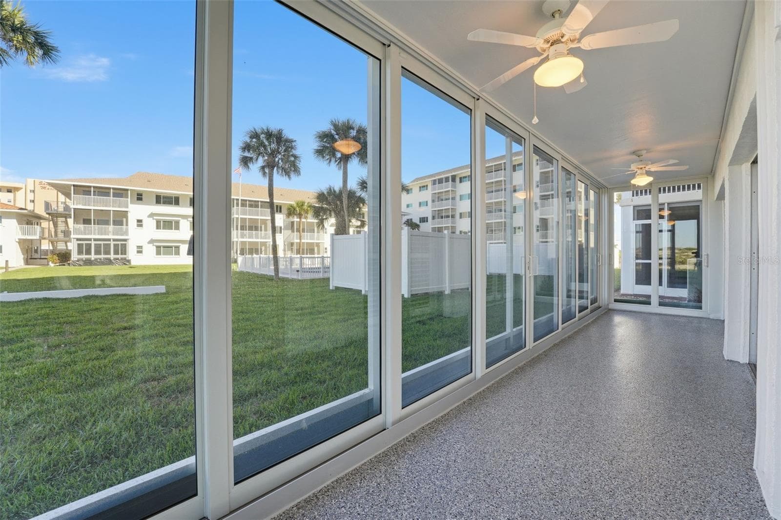 Huge lanai runs length of the condo - 1150 TARPON CENTER DR #101, 1-A, VENICE