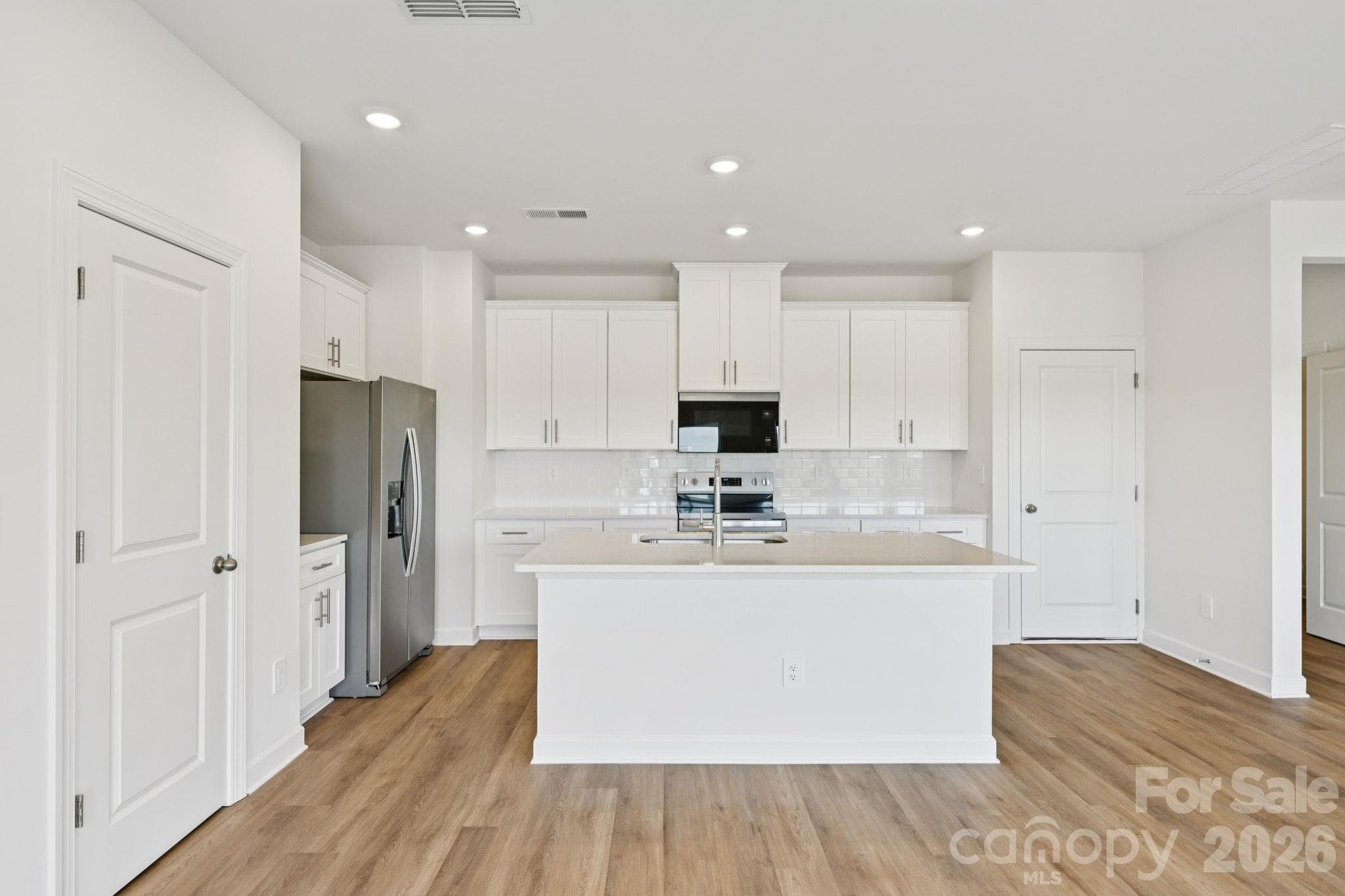 Photo is not of the actual home, but is an inspirational photo of builder’s model home and may depict options, furnishings, and/or decorator features that are not included - 1440 Wildflower Street, Newton