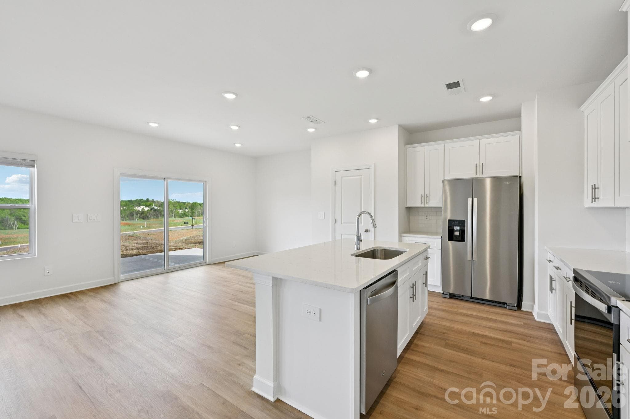 Photo is not of the actual home, but is an inspirational photo of builder’s model home and may depict options, furnishings, and/or decorator features that are not included - 1440 Wildflower Street, Newton