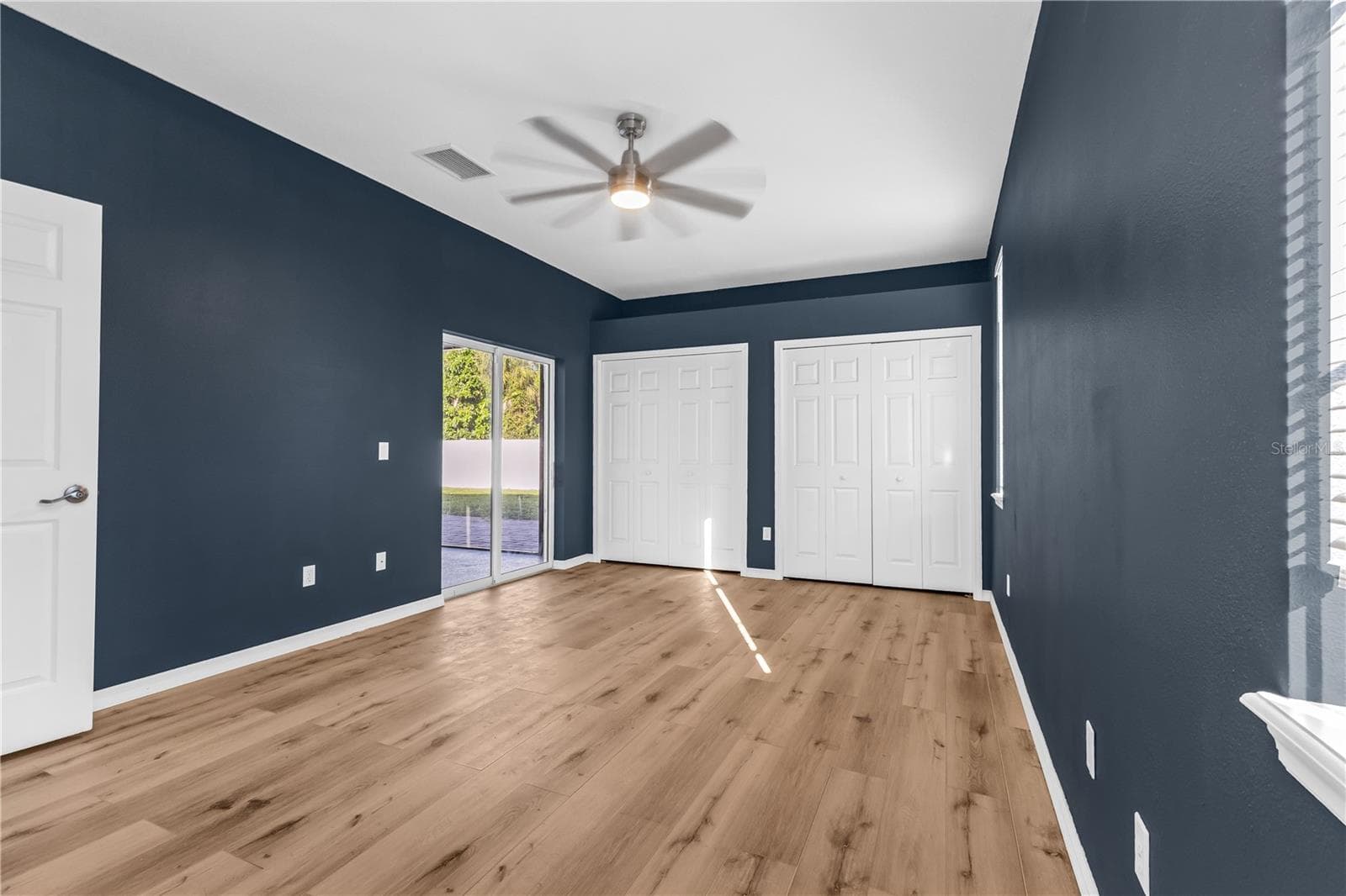 Primary bedroom with NEW vinyl flooring. - 2739 ATWATER DR, NORTH PORT