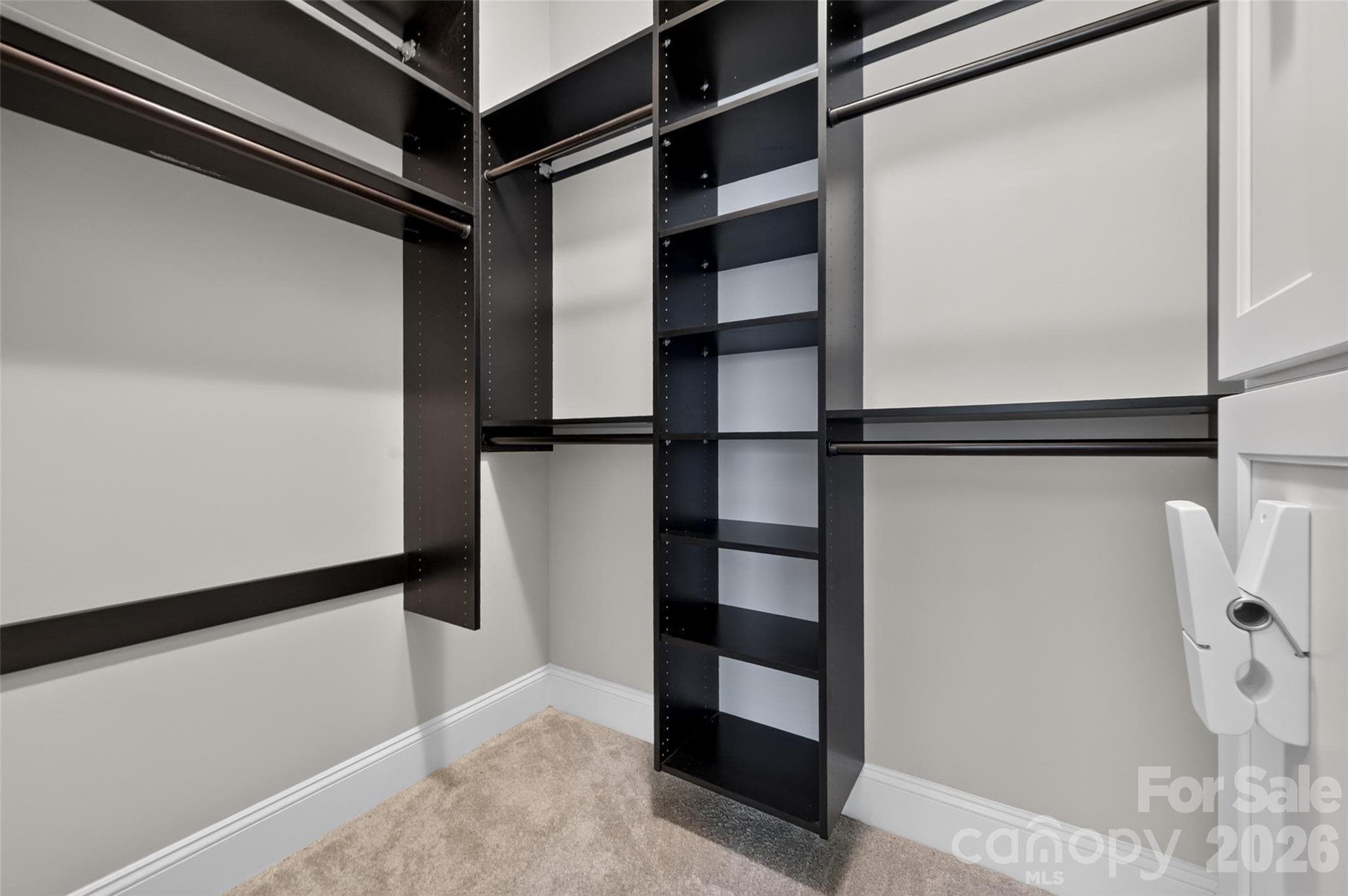 Bed 1 walk in closet with built in shelving - 4620 Piedmont Row Drive, Charlotte