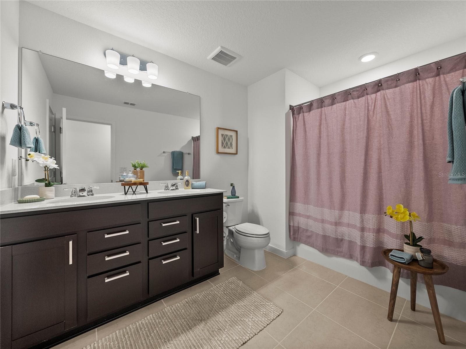 Upstairs Spacious Full 3rd Bath with Dual Sinks, Extra Long Vanity w/Dual Drawer Banks and Built in Linen Closet - 1076 KISTNA DR, ZEPHYRHILLS