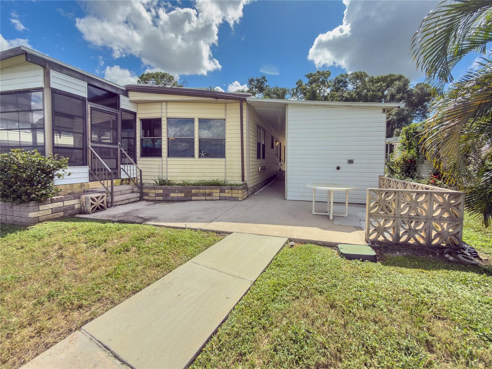 Patio out Back overlooks lake - 808 53RD AVE E #301, BRADENTON