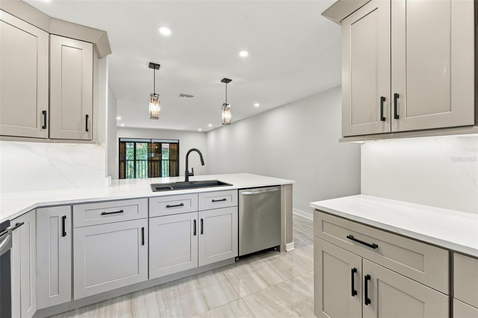 Abundant cabinetry and storage space throughout the kitchen - 2650 COUNTRYSIDE BLVD #A306, CLEARWATER