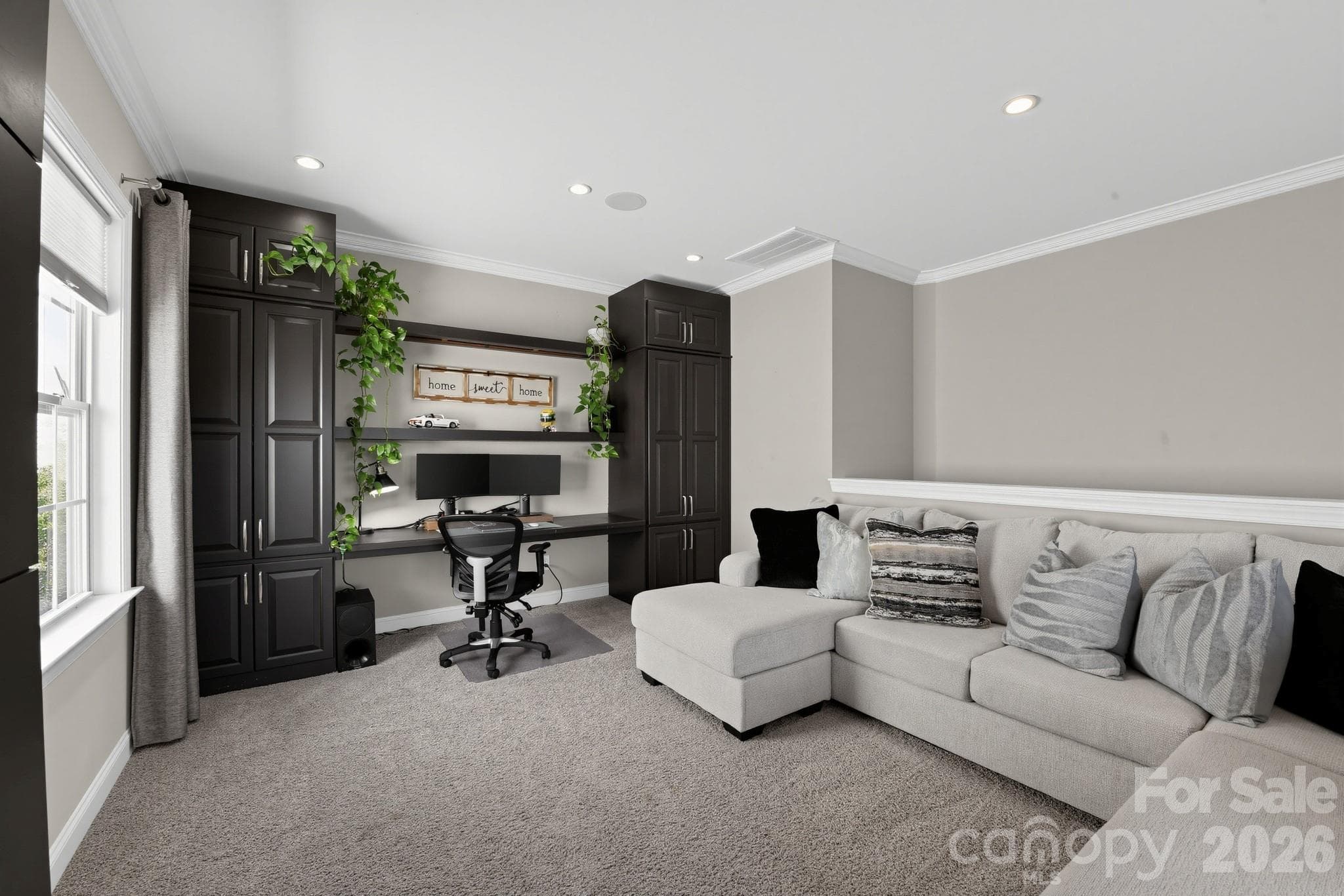 loft area with built in cabinetry - 13013 Jacks Lane, Pineville
