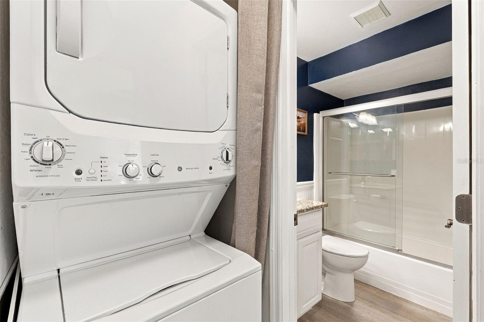 Convenient Indoor Laundry Featuring Stacked Washer and Dryer - 12538 SW KINGSWAY CIR #1008, LAKE SUZY