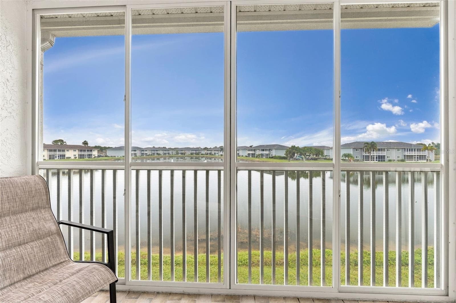 Peaceful Waterfront Retreat from Your Private Lanai - 12538 SW KINGSWAY CIR #1008, LAKE SUZY