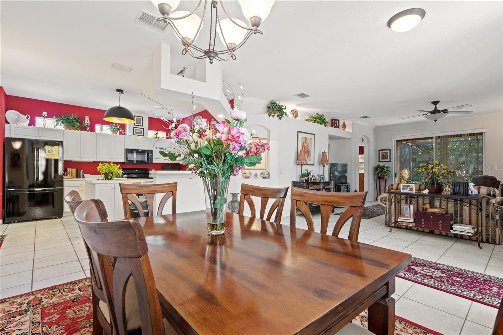 DINING ROOM AND KITCHEN - 8112 AMBERSWEET PL, LAND O LAKES