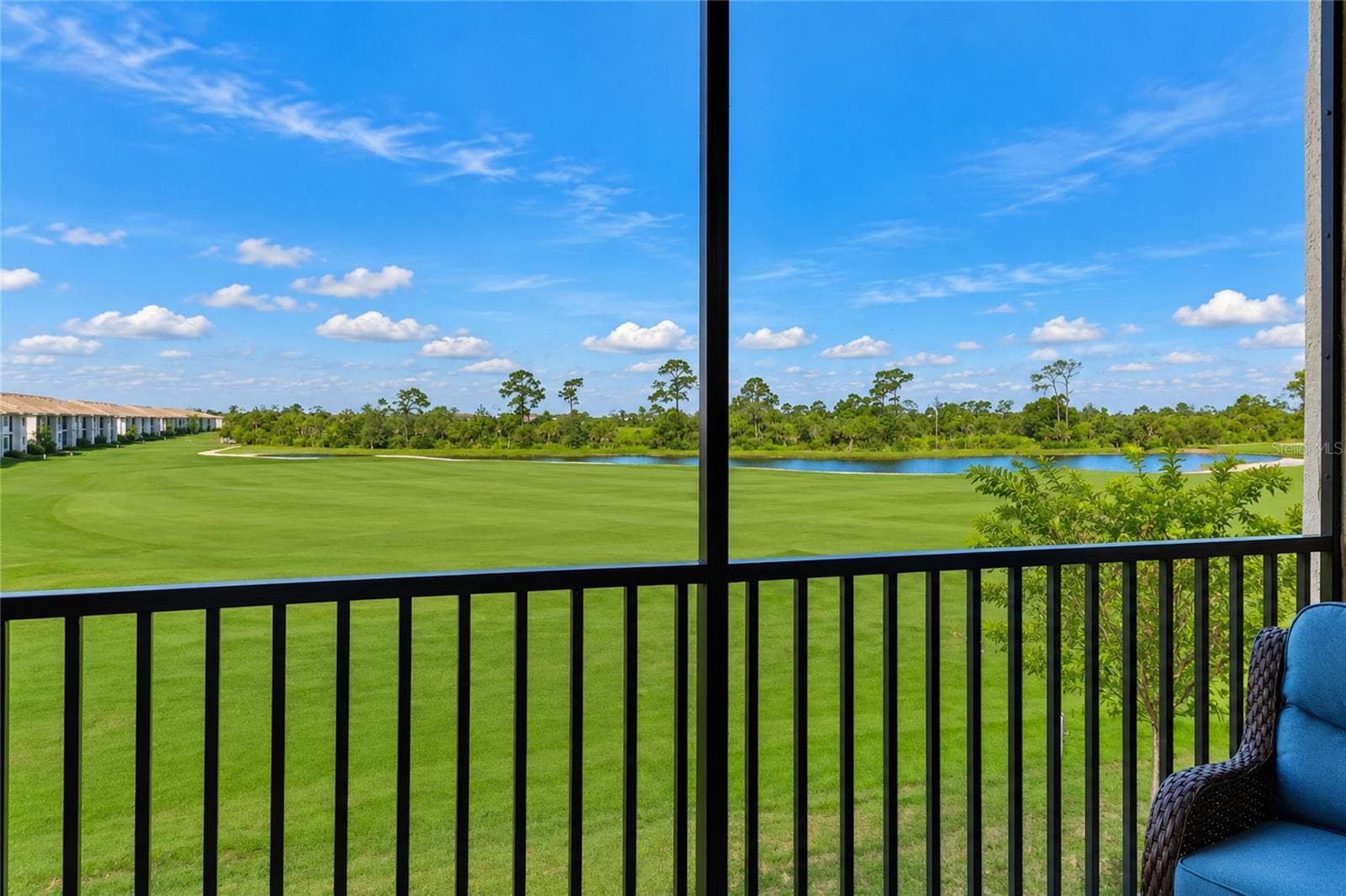 Screened and covered Lanai with Golf Course, Water and preserve views - 17565 OPAL SAND DR #204, VENICE