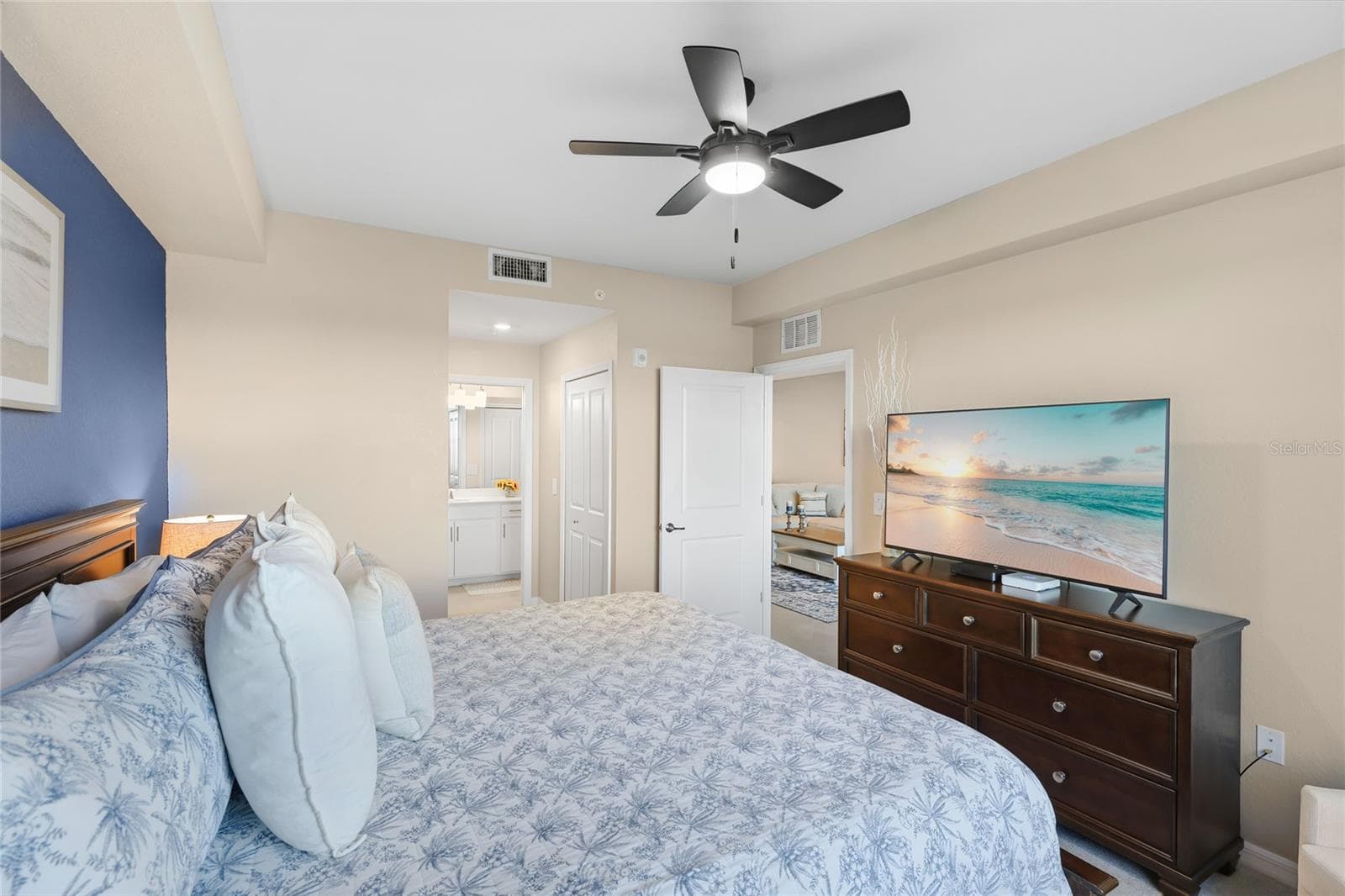 Spacious Owner's suite with ensuite bathroom and walk in closets overlooking the Golf Course, Water and preserve views - 17565 OPAL SAND DR #204, VENICE
