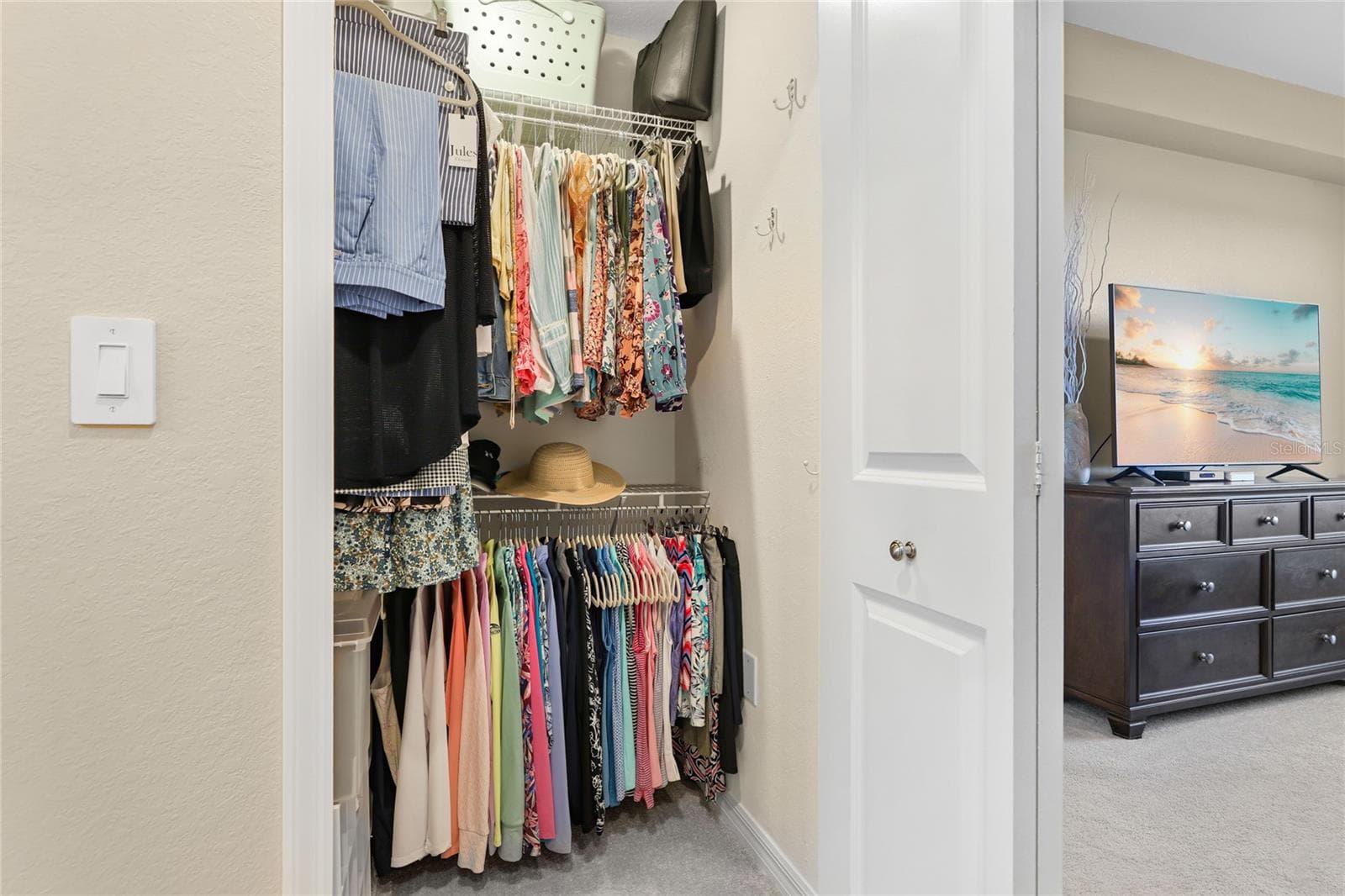 One of two Large walk-in closet's with additional shelving. - 17565 OPAL SAND DR #204, VENICE