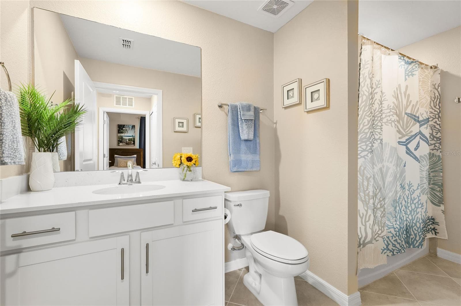 Spacious Second Bathroom with Shower with tub. - 17565 OPAL SAND DR #204, VENICE