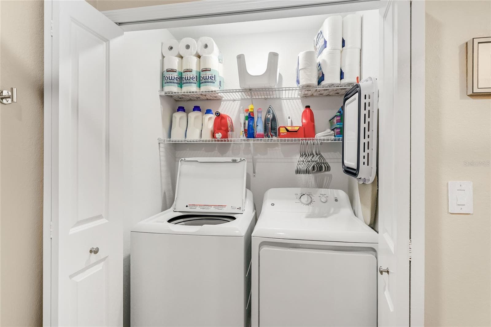 Laundry Closet with additional shelving - 17565 OPAL SAND DR #204, VENICE