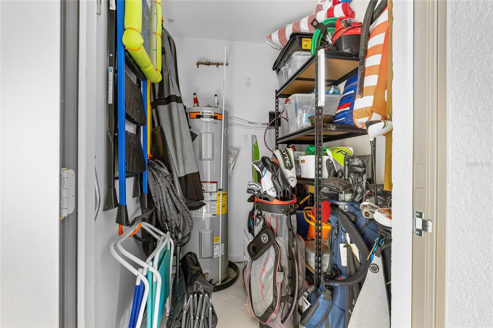 Additional storage closet offering convenient space for your storage needs. - 17565 OPAL SAND DR #204, VENICE