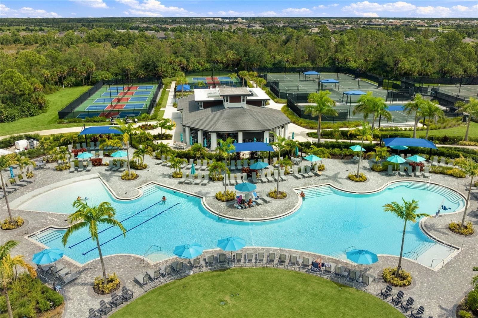 Welllen Park Golf and Country Club Resort Style Pool and Tiki Bar and Restaurant. Abundance of Pickleball and Tennis Courts at Wellen Park Golf and Country Club. - 17565 OPAL SAND DR #204, VENICE