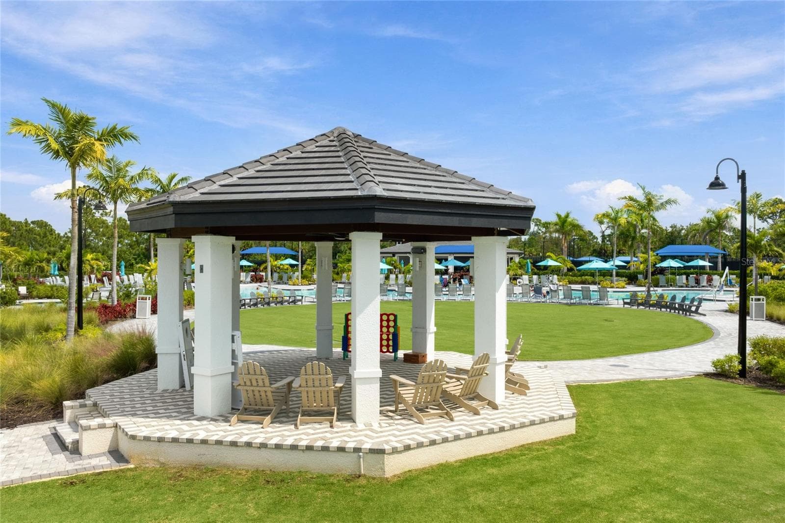 Covered pavilion provides a comfortable shaded retreat to relax and take a break from the sun. - 17565 OPAL SAND DR #204, VENICE