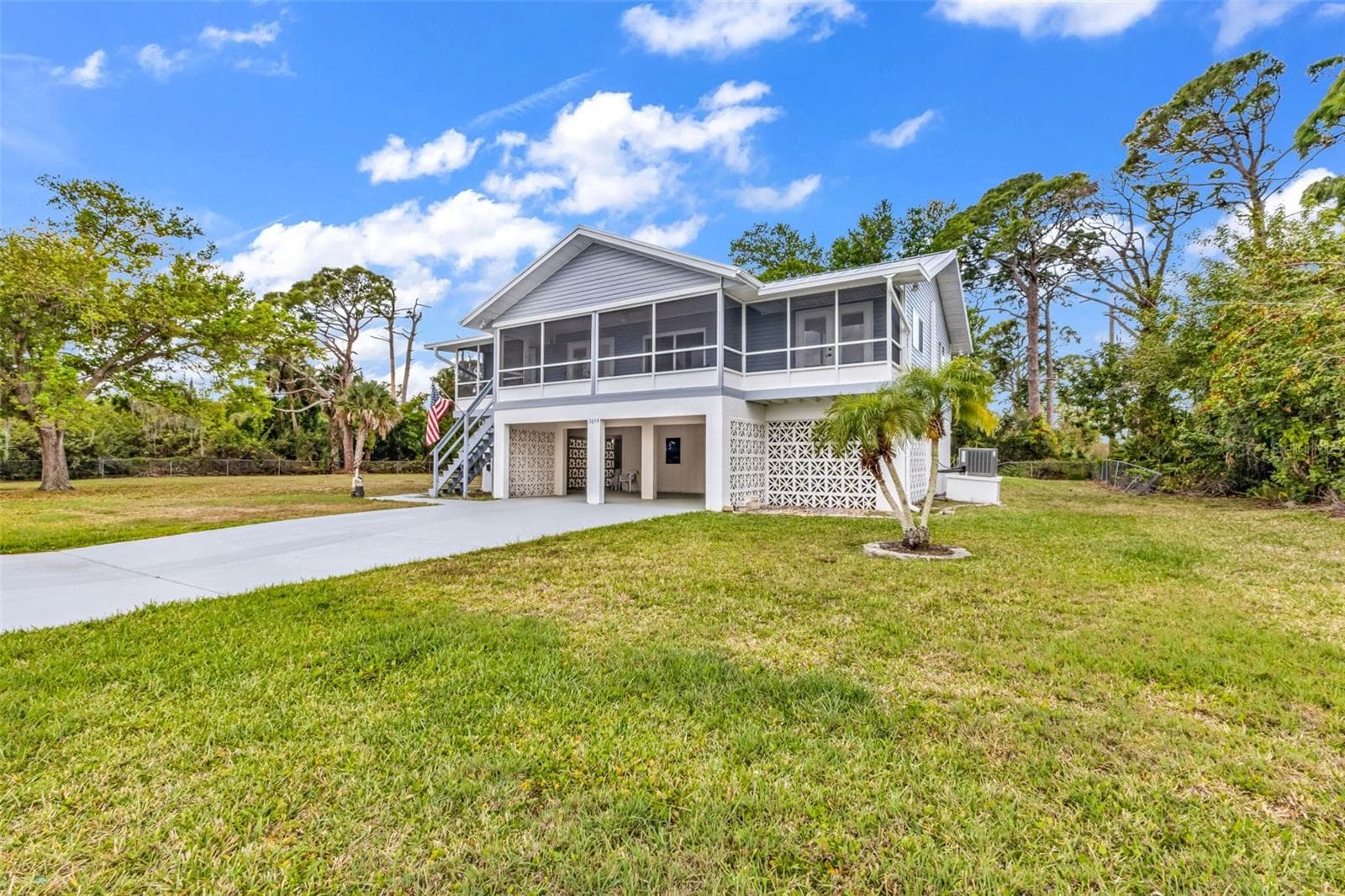 Single Family Residence at 3059 HOLCOMB RD, PORT CHARLOTTE, photo 2 of 66