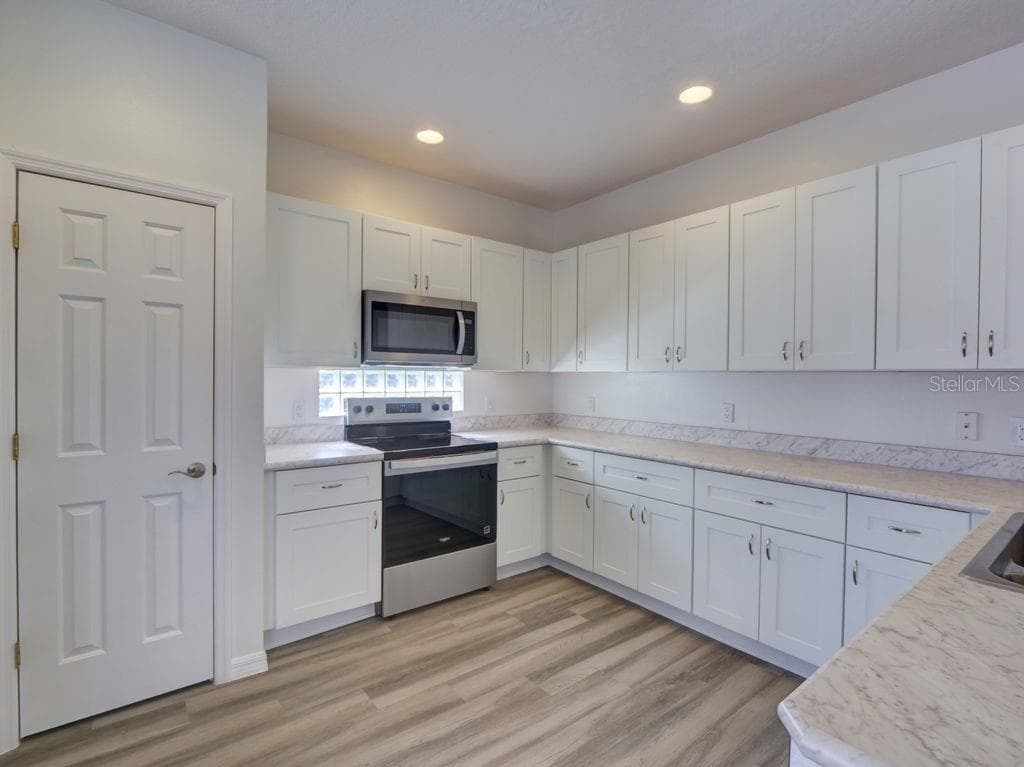 Single Family Residence at 9013 HEATHLAND CT, MOUNT DORA, photo 15 of 73
