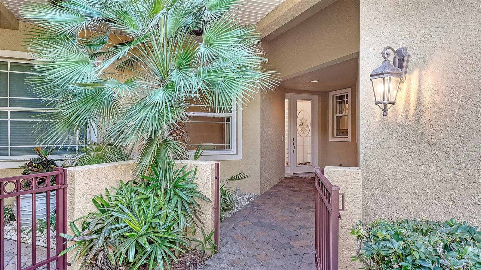 Front entry with gate - 6531 MOORINGS POINT CIR #102, LAKEWOOD RANCH