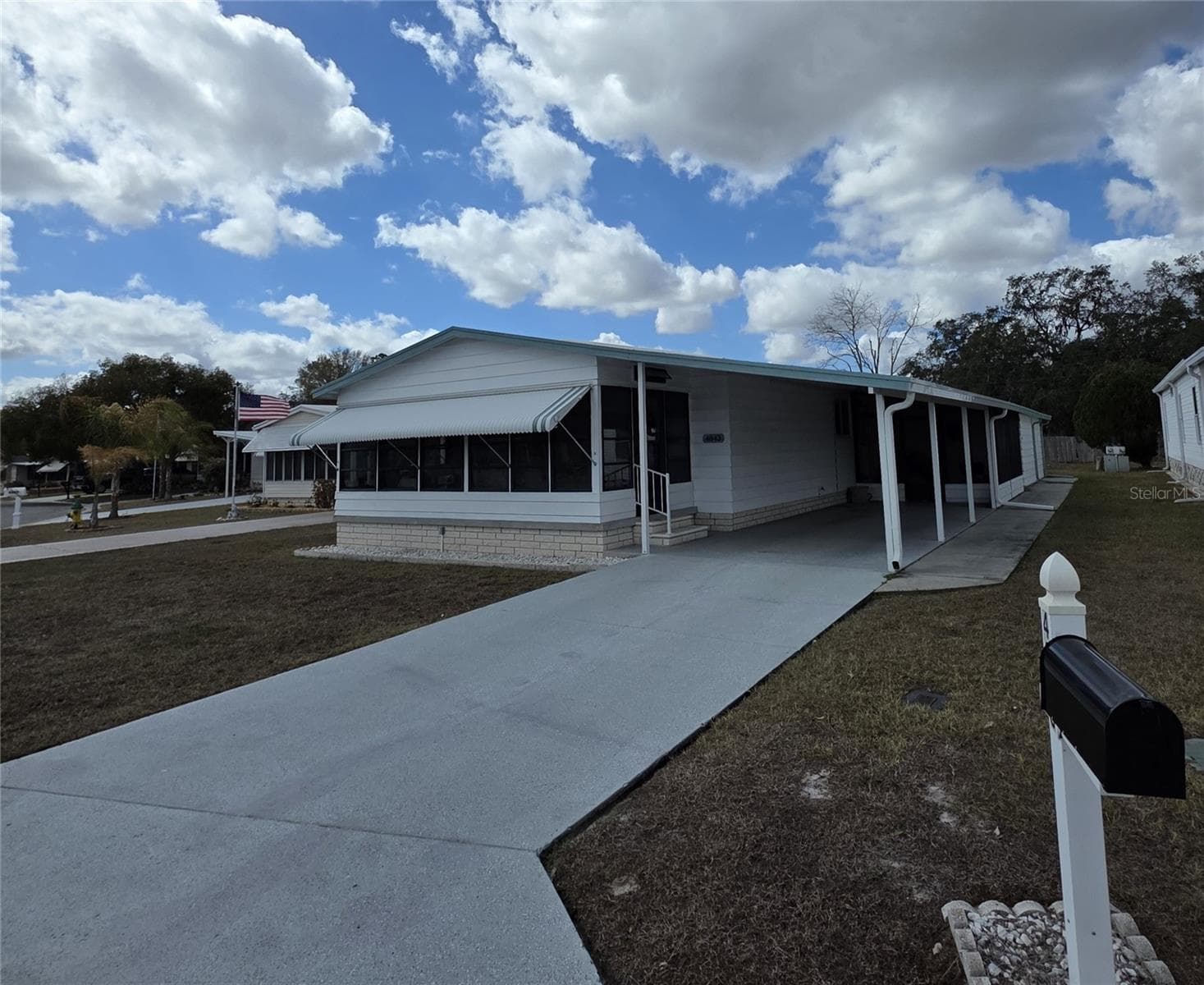 Manufactured Home at 4843 BLANCO DR, ZEPHYRHILLS, photo 2 of 45