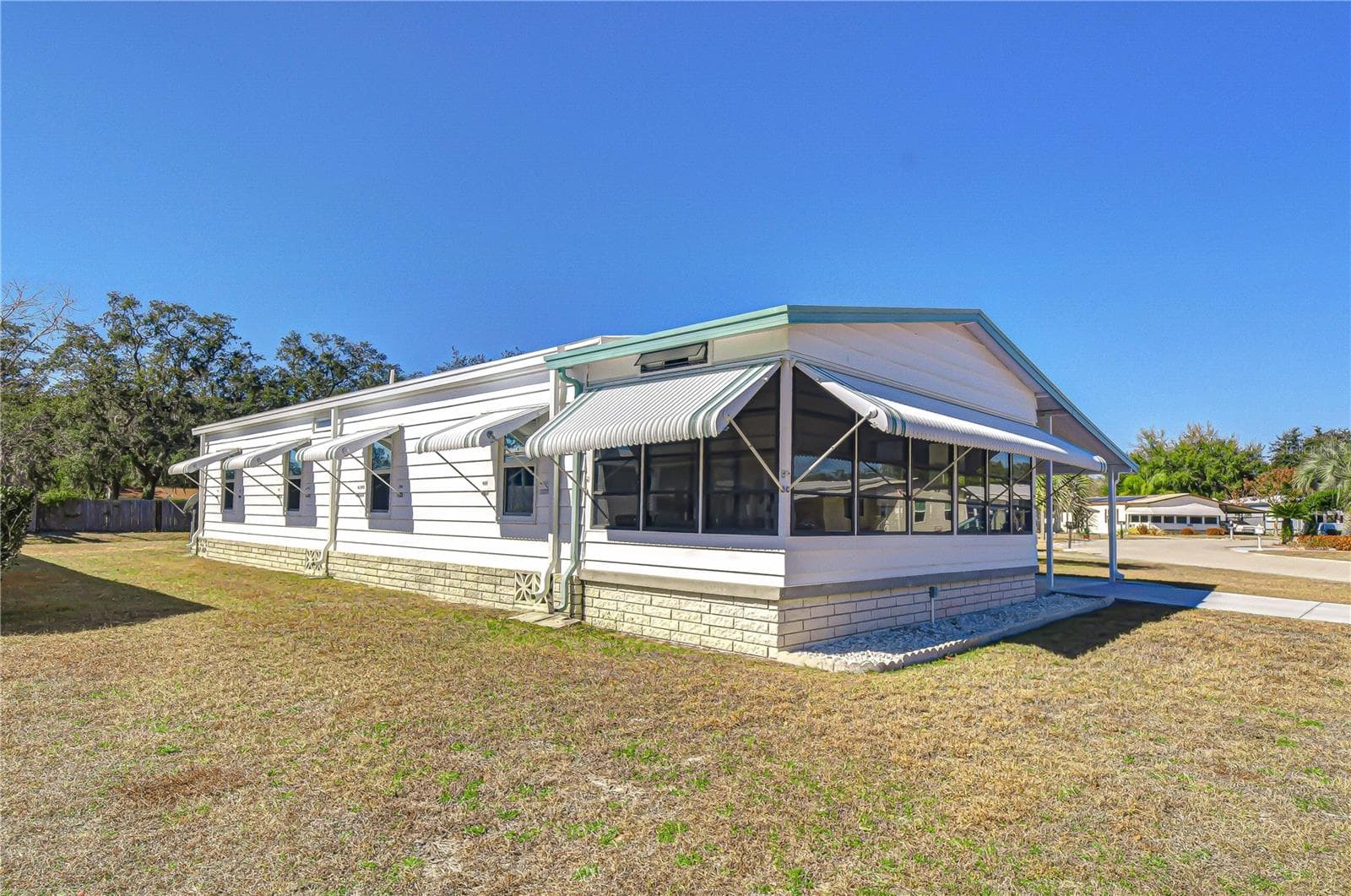 Manufactured Home at 4843 BLANCO DR, ZEPHYRHILLS, photo 3 of 45